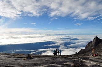 A mountaintop overlooking the sea of clouds below